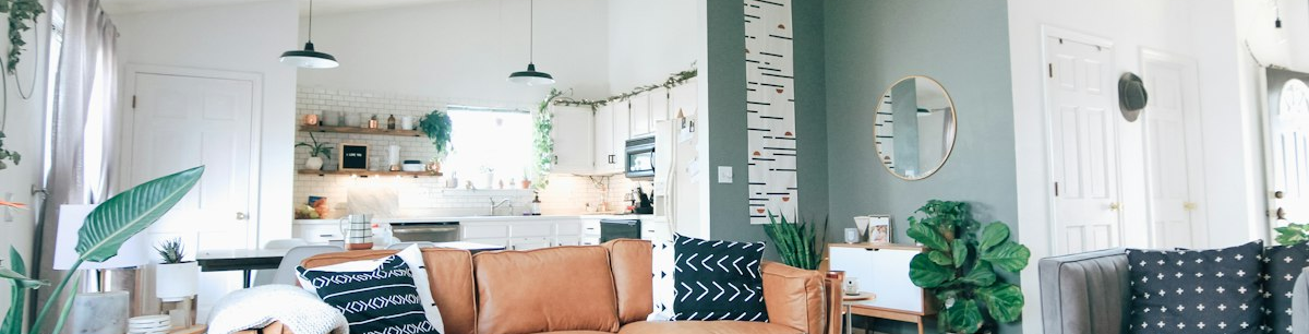 A warm, furnished shared living room at First Field